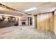 Basement with fireplace and wood paneling at 12434 E Alaska Ave, Aurora, CO 80012
