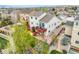 Home's backyard features mature trees, a deck, and meticulous landscaping at 735 Chesapeake Ave, Monument, CO 80132