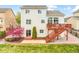 Backyard boasts a deck with stairs, a well-maintained lawn, and tidy landscaping at 735 Chesapeake Ave, Monument, CO 80132