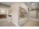 Hallway with a built-in reading nook and access to the basement at 735 Chesapeake Ave, Monument, CO 80132