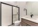 Modern bathroom with a shower, sleek vanity, and stylish fixtures at 231 Leafy Aster Ln, Castle Rock, CO 80104