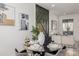 Tastefully decorated dining area adjoining a cozy living room with modern decor at 561 Cherokee St, Denver, CO 80204