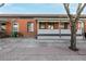 Inviting exterior of a well-maintained brick home with a covered front porch at 561 Cherokee St, Denver, CO 80204
