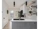 Modern kitchen featuring white cabinets, stainless steel appliances, and a bright, open layout at 561 Cherokee St, Denver, CO 80204