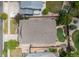 Aerial view showcases a landscaped backyard and detailed roof of this charming property at 6520 S Newcastle Way, Aurora, CO 80016
