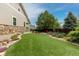 Spacious backyard with lush green lawn, perfect for outdoor activities and relaxation at 6520 S Newcastle Way, Aurora, CO 80016