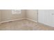 Neutral bedroom featuring a window with blinds and a closet with sliding doors at 6520 S Newcastle Way, Aurora, CO 80016