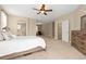 Spacious main bedroom boasts an ensuite bath and walk-in closet at 6520 S Newcastle Way, Aurora, CO 80016