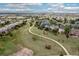 Scenic aerial view of the community with walking path, highlighting its beautiful surroundings at 6520 S Newcastle Way, Aurora, CO 80016