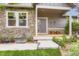 Inviting front entrance with stone accents, decorative details, and a cozy, welcoming porch at 2716 Dundee Pl, Erie, CO 80516