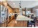 Spacious kitchen with stainless appliances, granite countertops, and bar stool seating at 2716 Dundee Pl, Erie, CO 80516