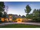 Stunning contemporary home with a circular driveway and landscaped grounds at 52 Sedgwick Dr, Cherry Hills Village, CO 80113