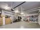 Organized garage with overhead storage and shelving at 52 Sedgwick Dr, Cherry Hills Village, CO 80113