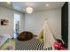 Playful ' room with teepee, beanbag chair, and toys at 52 Sedgwick Dr, Cherry Hills Village, CO 80113