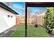 Beautiful backyard featuring a manicured lawn, a stylish fire pit, and cozy outdoor seating at 1518 S Columbine St, Denver, CO 80210