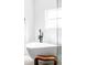 Sleek bathroom with modern fixtures, a stylish soaking tub, and minimalist design for a luxurious feel at 1518 S Columbine St, Denver, CO 80210