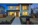 Striking modern home with clean lines, large windows, and professionally landscaped front yard at 1518 S Columbine St, Denver, CO 80210