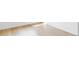 Light hardwood flooring with white baseboards provides a clean and modern look to any room at 1518 S Columbine St, Denver, CO 80210