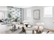 Modern living room featuring stylish seating, contemporary artwork, and an eye-catching glass wine display at 1518 S Columbine St, Denver, CO 80210