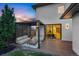 Inviting outdoor living space features comfortable seating under a stylish pergola, perfect for relaxing and entertaining at 1518 S Columbine St, Denver, CO 80210