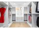 Spacious walk-in closet with custom shelving and ample storage for an organized wardrobe and accessories at 1518 S Columbine St, Denver, CO 80210