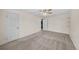 Spacious carpeted bedroom with natural light and ample closet space at 16563 E Kansas Pl, Aurora, CO 80017