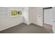 Neutral bedroom with carpet, window, and closet at 16563 E Kansas Pl, Aurora, CO 80017
