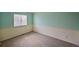 Empty bedroom with fresh paint, carpet, and natural light at 611 Branding Iron Ln, Castle Rock, CO 80104