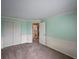 Another view of empty bedroom highlighting the closet and ensuite bathroom access at 611 Branding Iron Ln, Castle Rock, CO 80104