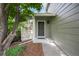 Close up of the home's entryway, showing the front door and the house number at 611 Branding Iron Ln, Castle Rock, CO 80104