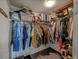 Organized walk-in closet with ample storage space for clothes and accessories at 611 Branding Iron Ln, Castle Rock, CO 80104