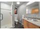 Modern bathroom with walk-in shower and updated fixtures at 1401 Wewatta St # 204, Denver, CO 80202