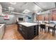 Modern kitchen with island and stainless steel appliances at 1401 Wewatta St # 204, Denver, CO 80202