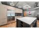 Modern kitchen with stainless steel appliances and island at 1401 Wewatta St # 204, Denver, CO 80202