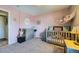 Bedroom featuring gray walls, carpet, decor, small window and white doors at 114 Walnut Dr, Frederick, CO 80530