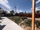 Spacious backyard featuring a garden area with raised beds, offering opportunities for gardening and relaxation at 481 Cragmore St, Denver, CO 80221