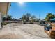Large concrete patio perfect for outdoor activities, with fencing offering privacy for your backyard enjoyment at 481 Cragmore St, Denver, CO 80221