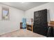 Cozy bedroom featuring soft carpet, a window with blinds, and ample space for storage solutions at 481 Cragmore St, Denver, CO 80221