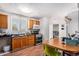 Kitchen with stainless steel appliances and a double basin sink at 481 Cragmore St, Denver, CO 80221