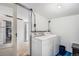 Practical laundry room equipped with a washer and dryer, offering convenience and efficiency at 481 Cragmore St, Denver, CO 80221