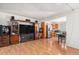 Living room area with open concept kitchen and an entertainment center at 481 Cragmore St, Denver, CO 80221