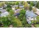 The backyard is fenced in and has a well-maintained lawn and mature trees, perfect for outdoor activities at 3916 S Telluride Ct, Aurora, CO 80013
