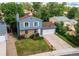The exterior showcases a charming home with well-manicured lawn and an attached garage at 3916 S Telluride Ct, Aurora, CO 80013