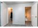 Hallway with access to a closet and stairwell at 3916 S Telluride Ct, Aurora, CO 80013