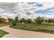 Scenic walking trail with lush greenery and mature trees at 3916 S Telluride Ct, Aurora, CO 80013