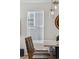 This breakfast nook features counter seating and light pendants at 17214 W 94Th Ave, Arvada, CO 80007