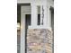 Close-up of front door number with stone pillar at 17214 W 94Th Ave, Arvada, CO 80007
