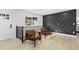 Bright entryway with two modern leather armchairs at 9163 W 75Th Cir, Arvada, CO 80005