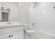 Bathroom featuring a shower-tub combo, vanity, and toilet at 8028 Williams Fork Ave, Littleton, CO 80125
