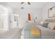 Inviting bedroom with stylish decor, a comfortable bed, and ample natural light at 8028 Williams Fork Ave, Littleton, CO 80125